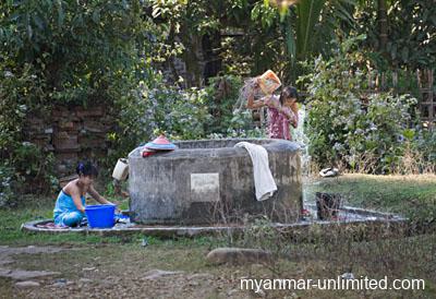 Women at the village well bathe just like their predecessors a hundred years ago @ Birgit Neiser